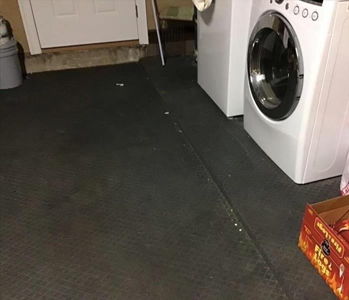 laundry room with water removed and dried